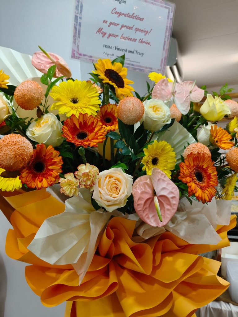 A congratulations flower bouquet wishing the new Kuala Lumpur office success