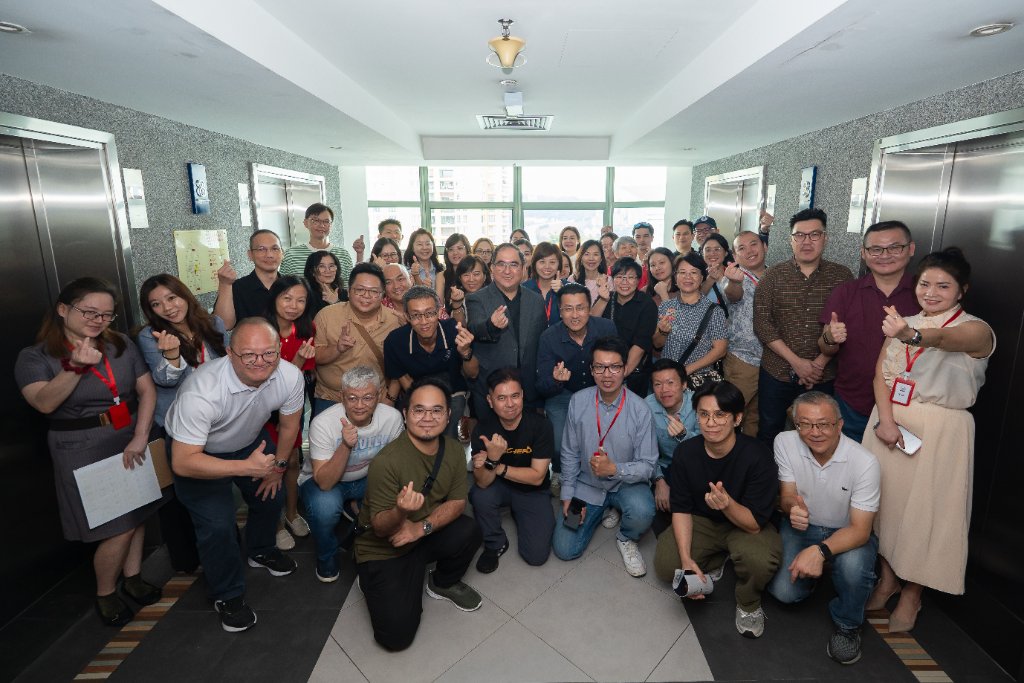 Dougles Chan with the team and guests gathered for a group photo at the new Kuala Lumpur office