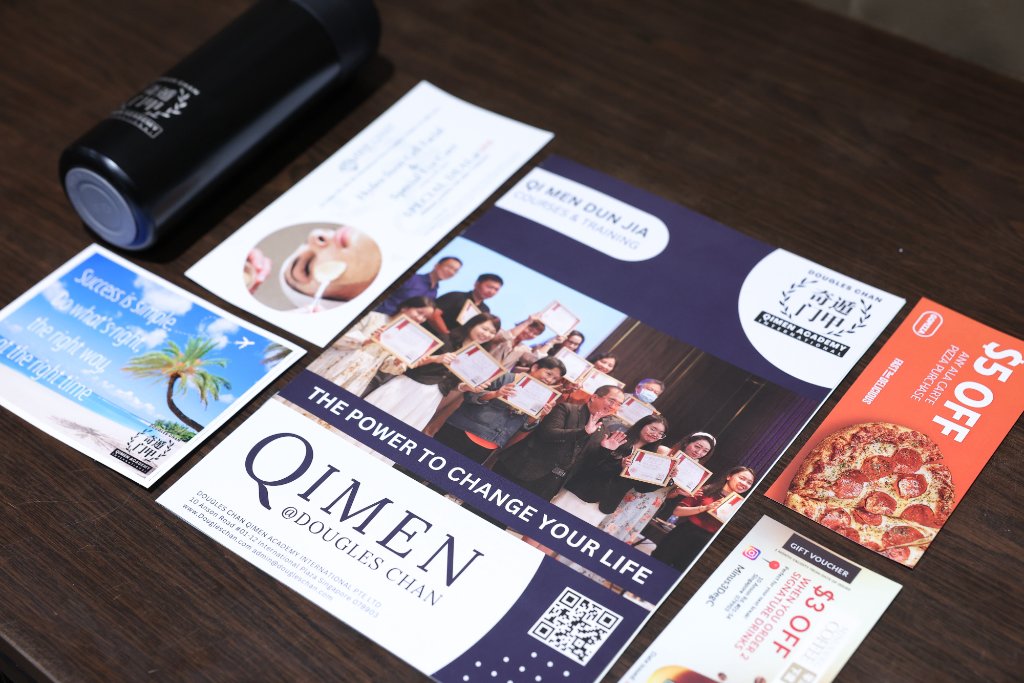 Dougles Chan Qimen Academy International marketing materials and branded merchandise